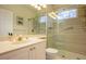 Bathroom with walk-in shower and single vanity at 7117 Victoria Circle, University Park, FL 34201