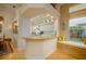 Kitchen with granite countertops and breakfast bar at 7117 Victoria Circle, University Park, FL 34201