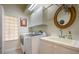Laundry room with washer, dryer, and utility sink at 7117 Victoria Circle, University Park, FL 34201