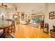Spacious living area with hardwood floors and fireplace at 7117 Victoria Circle, University Park, FL 34201