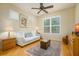 Cozy sitting room with hardwood floors and large window at 7117 Victoria Circle, University Park, FL 34201