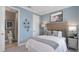 Bright bedroom with a queen bed and ensuite bathroom at 8061 Moonbeam Ave, Sarasota, FL 34241