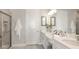 Elegant bathroom with double vanity and walk-in shower at 8105 Moonbeam Ave, Sarasota, FL 34241