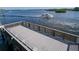 Spacious gray composite fishing pier overlooking the water at 1200 E Peppertree Ln # 607, Sarasota, FL 34242