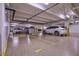 Underground parking garage with designated parking spots at 1200 E Peppertree Ln # 607, Sarasota, FL 34242