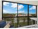 Balcony with seating and scenic views at 2045 Gulf Of Mexico Dr # M1-502, Longboat Key, FL 34228