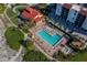 Inviting community pool with lounge chairs, perfect for relaxation at 2045 Gulf Of Mexico Dr # M1-502, Longboat Key, FL 34228