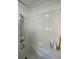Bathroom with white subway tile and jetted tub at 222 27Th W St, Bradenton, FL 34205