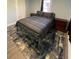 Cozy bedroom featuring a double bed, nightstands and area rug at 222 27Th W St, Bradenton, FL 34205
