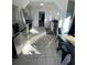 Modern kitchen with stainless steel appliances and granite countertops at 222 27Th W St, Bradenton, FL 34205