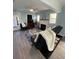 Living room features a fireplace and a black couch at 222 27Th W St, Bradenton, FL 34205