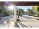 Landscaped front yard with tropical plants and gravel at 2905 Gulf Dr, Holmes Beach, FL 34217