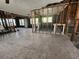 Spacious living room undergoing renovation with exposed framing at 3181 Irving St, Sarasota, FL 34237