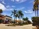 Scenic town center with palm trees and shops at 321 Lansbrook Dr, Venice, FL 34292