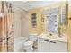 Clean bathroom featuring a bath tub, single sink vanity, and neutral decor at 3750 Pinebrook Cir # 404, Bradenton, FL 34209