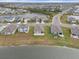 Aerial view of several homes in a lakeside neighborhood at 4108 Silver Strand Trl, Palmetto, FL 34221