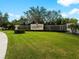 Community entrance with a beautiful water feature at 4156 Cascade Falls Dr, Sarasota, FL 34243