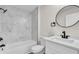 Clean bathroom with a white vanity and marble shower at 4613 Muirfield Dr, Bradenton, FL 34210