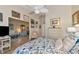 Bedroom with comfortable bed and view of living area at 504 Woodstork Cir, Bradenton, FL 34209