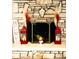 Cozy stone fireplace with decorative accents and a warm ambiance at 5630 3Rd W St, Bradenton, FL 34207