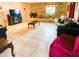 Living room with a stone fireplace and comfortable seating at 5630 3Rd W St, Bradenton, FL 34207
