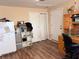 Home office with wood flooring, desk and storage at 5630 3Rd W St, Bradenton, FL 34207