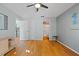 Bright bedroom with hardwood floors and access to bathroom at 608 N Jefferson Ave # 30, Sarasota, FL 34237