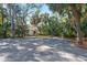 Guest parking area with palm trees at 608 N Jefferson Ave # 30, Sarasota, FL 34237