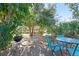 Small patio with table and chairs, offering a relaxing outdoor space at 608 N Jefferson Ave # 30, Sarasota, FL 34237