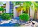 Condo entrance with landscaping and walkway at 6191 Timber Lake Dr # A5, Sarasota, FL 34243