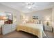 Spacious bedroom with king-size bed and ample dresser space at 6713 Stone River Rd # 104, Bradenton, FL 34203