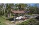 Covered parking for boat and tractor; solar panel visible at 6919 64Th E Ave, Palmetto, FL 34221