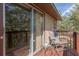 Private deck with seating and sliding glass door access at 6919 64Th E Ave, Palmetto, FL 34221