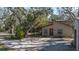 Two story house with covered porch and mature landscaping at 6919 64Th E Ave, Palmetto, FL 34221