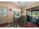Kitchen features a breakfast nook and sliding glass doors to the patio at 6919 64Th E Ave, Palmetto, FL 34221