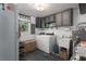 Laundry room with washer, dryer, and additional storage at 6919 64Th E Ave, Palmetto, FL 34221