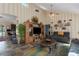Living room with large entertainment center and tiled floor at 6919 64Th E Ave, Palmetto, FL 34221