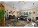 Spacious living room with vaulted ceiling, two sofas, and tiled floor at 6919 64Th E Ave, Palmetto, FL 34221