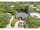 Single-story home on a canal with lush landscaping at 7707 10Th Nw Ave, Bradenton, FL 34209