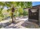 Peaceful backyard oasis with water view and patio seating at 7707 10Th Nw Ave, Bradenton, FL 34209