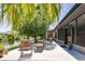 Relaxing patio by the canal with outdoor furniture at 7707 10Th Nw Ave, Bradenton, FL 34209