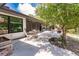 Screened patio with a seating area and fire pit at 7707 10Th Nw Ave, Bradenton, FL 34209