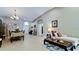 Bright dining room with tile floors and access to the living room at 9008 Willowbrook Cir, Bradenton, FL 34212