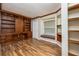 Home office with built-in wooden desk and shelving at 1010 Southern Pine Ln, Sarasota, FL 34243