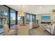 Bright dining area with ocean view and seating for four at 1211 Gulf Of Mexico Dr # 108, Longboat Key, FL 34228