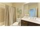Clean bathroom with shower, vanity, and white countertop at 1387 Still River Dr, Venice, FL 34293