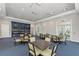 Community clubhouse with bookshelves, tables, and chairs at 1387 Still River Dr, Venice, FL 34293