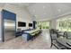 Clubhouse kitchen featuring stainless steel appliances, blue cabinets, and ample counter space at 1387 Still River Dr, Venice, FL 34293