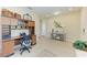 Entryway with a desk, storage hutch and decorative console table at 1387 Still River Dr, Venice, FL 34293