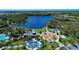 Community park with a playground, splash pad, and a large lake at 1387 Still River Dr, Venice, FL 34293